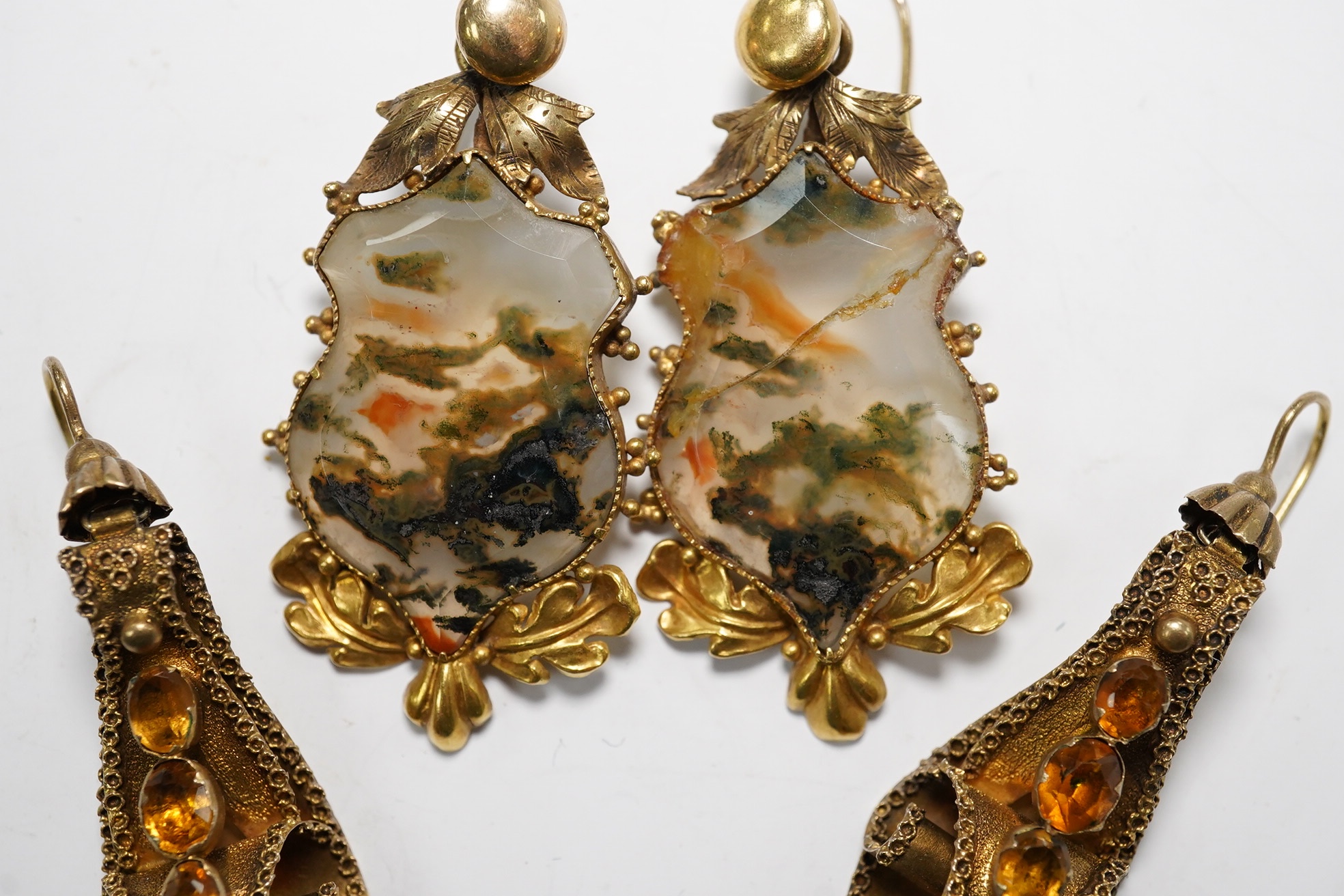 Two pairs of Victorian yellow metal earrings, one set with moss agate (a.f.) and one with citrine coloured stones, longest 50mm. Condition - poor to fair